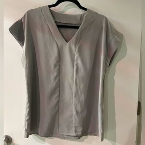 Grey cap sleeve blouse.
